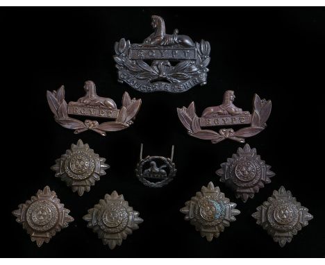 First World War Gloucestershire Regiment Officers Service Dress badges in bronze including cap badge with two blades to the r