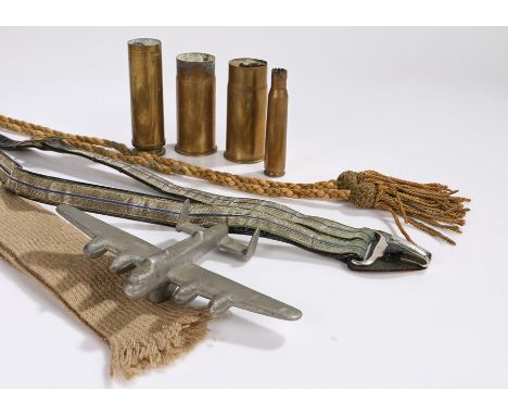 Mixed items, an alloy model of a Lancaster Bomber, set of officers sword hangers, officers tie, very worn bugle cords, shell 