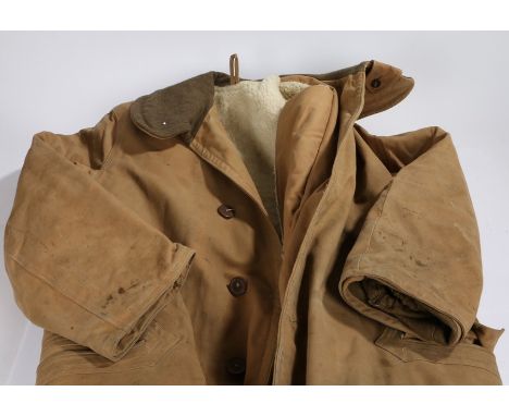 Second World War British army Full length single-breasted heavy-weight coat made of orange-brown canvas, lined with a waterpr