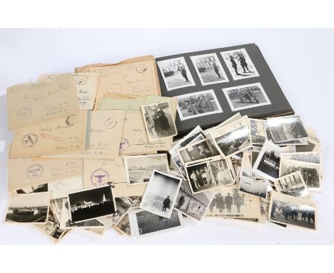 Second World War German photograph album with representation of German steel helmet on cover in relief, with 'Meine Dienstzei