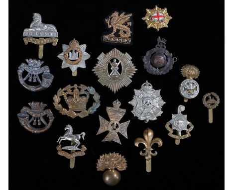 Selection of British army badges including The Royal Scots, The Kings Royal Rifle Corps, The Border Regiment, The Lincolnshir