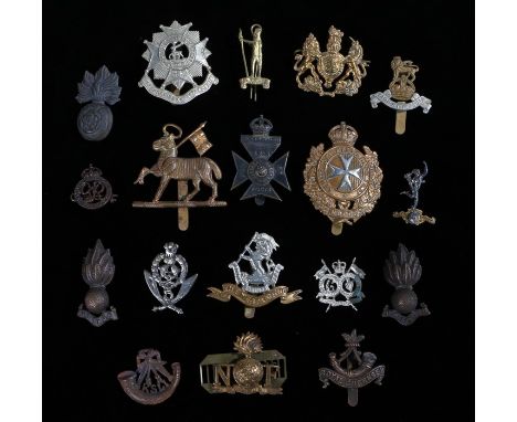 Selection of British army badges including The Royal Fusiliers, The Bedfordshire &amp; Hertfordshire Regiment, 11th Battalion