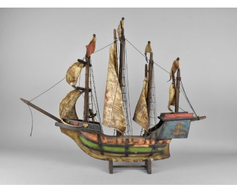 A Mid/Late 20th Century Wooden Model of a Four Mast Ship, Condition Issues, 62cms Wide 