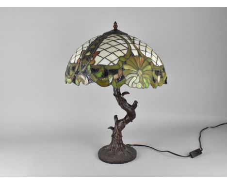 A Tiffany Style Table Lamp with Bronzed Branch Supports (Shade with Some Damage) 57cms High 