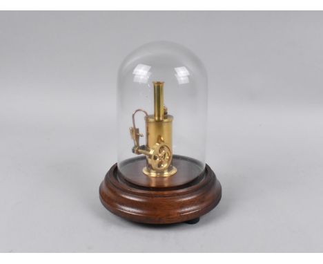 A Miniature Model of a Spirit Fired Single Cylinder Vertical Steam Engine on Wooden Plinth with Glass Dome, Missing Burner, 8