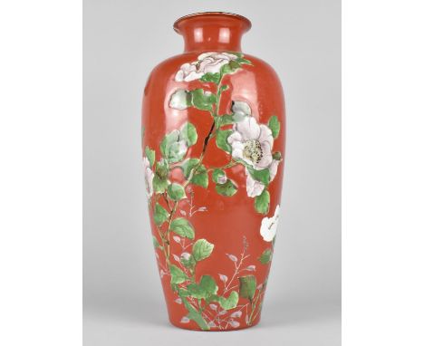 An Oriental Porcelain Vase decorated in Shallow Relief with Blossoming Chrysanthemums on Red Ground, Has Been Converted to La