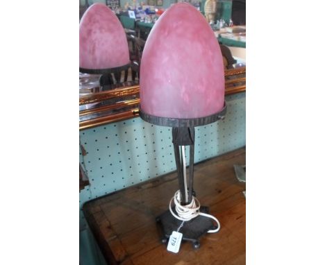 An early 20th century Continental metalware table lamp on hexagonal base, with mottled cane shaped globe, (46cm).