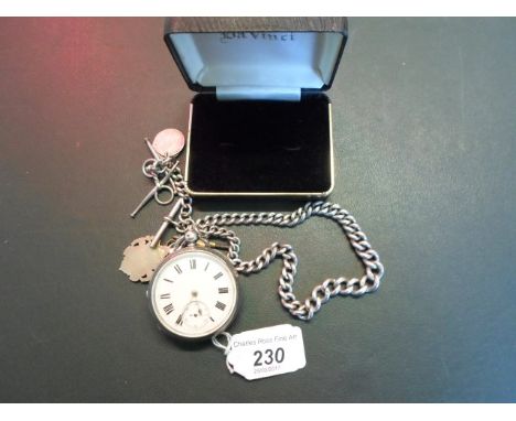 A silver cased pocket watch, the enamel dial bearing Roman numerals, subsidiary seconds dial at 6 o'clock, to a silver chain 