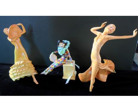 A Wade porcelain figurine of a lady in a Pierrot costume, together with two Wade Art Deco-style dancers titled Conchita and J
