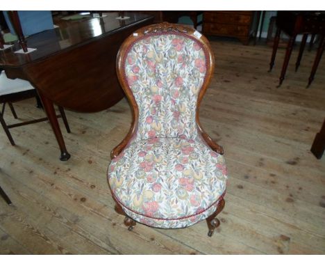 A Victorian lady's button back upholstered fireside chair, (56cm wide).