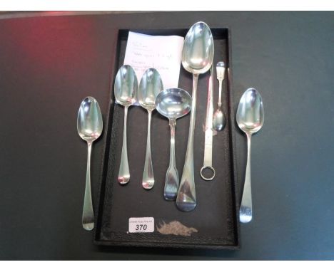 A harlequin set of four silver tablespoons, various dates and makers, together with a large silver plated serving spoon and o