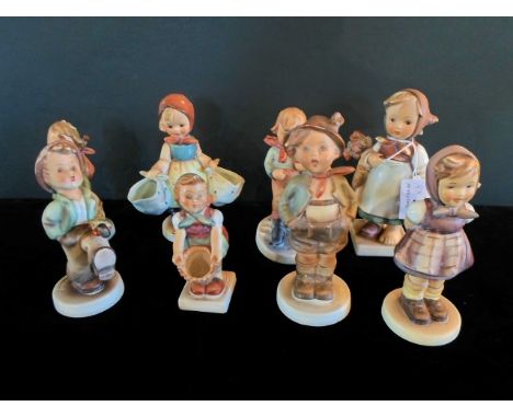 A collection of eight Hummel figurines, to include examples: 258, 204, 175, 300 and others.