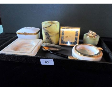 A mixed lot to include: Limoges porcelain box, onyx ashtrays, a Luxor travelling clock, a cased miniature pipe and other item