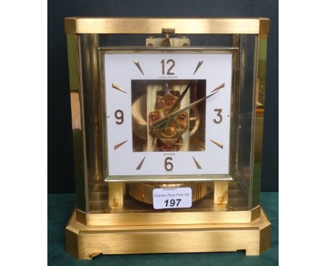 A Jaeger-leCoultre Atmos VIII gilt metal mantle clock/wall clock, the square dial bearing Arabic numerals and batons, the gil