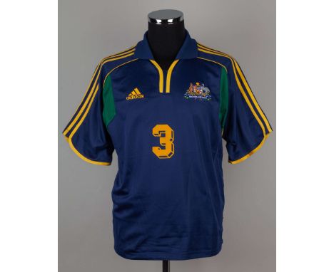 Craig Moore blue and yellow No.3 Australia short-sleeved shirt, 2001, Adidas, M, with v-neck collar and embroidered badge ins