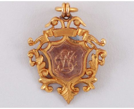 9ct gold Birmingham & District Championship medal, 1902-03, the obverse inscribed EWS, the reverse inscribed B & D F.L. Champ