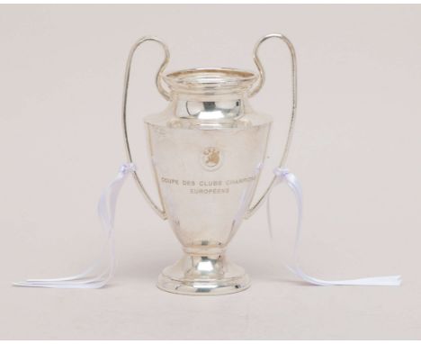 A white-metal Real Madrid CF 2022 UEFA Champions League Player Trophy by Alegre Joyeros, 18cm highIn the Champions League fin