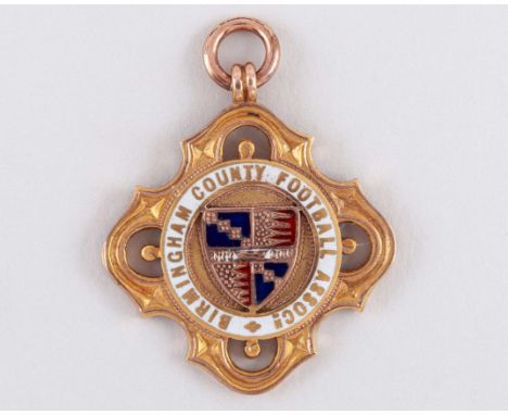 9ct gold and enamel football medal 1911-12, the obverse inscribed BIRMINGHAM COUNYTY FOOTBALL ASSOC, the reverse inscribed 19