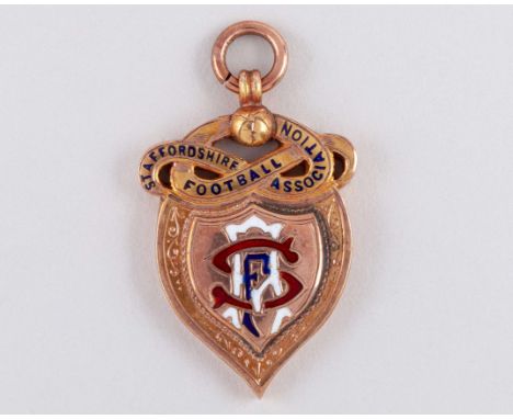 9ct gold and enamel football medal 1924-25, the obverse inscribed STAFFORDSHIRE FOOTBALLL ASSOCIATION, SFA, the reverse inscr
