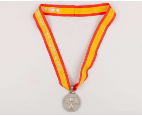 A white-metal Real Madrid Copa Del Rey 2003-2004 Runner-ups medal, the obverse inscribed COPA DE ESPANA S.M. EL RAY 2003 2004
