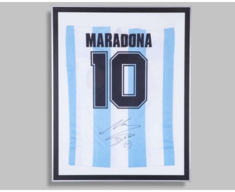 Diego Maradona signed Argentina replica shirt, signed in black marker, mounted, framed & glazed, 75 by 60cm.; sold with a COA