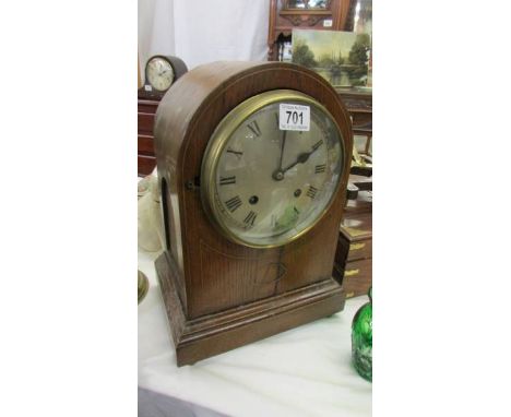 A good Edwardian oak eight day mantle clock.