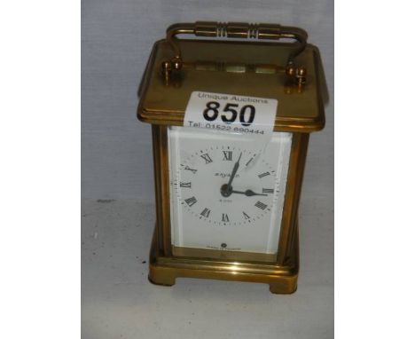 A Bayard brass carriage clock in working order.
