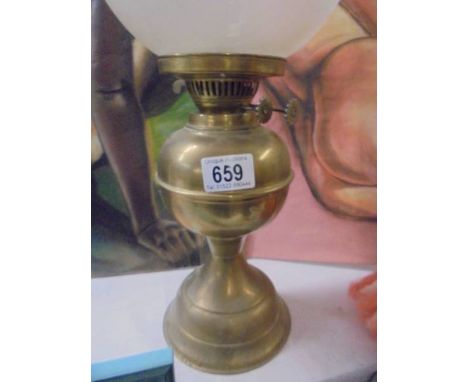 A brass oil lamp with etched shade, COLLECT ONLY.