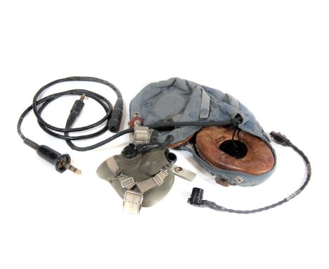 Flying Clothing, A RAF issue blue cloth flying helmet with leather ear pieces inscribed Alan Curry with associated oxygen mas