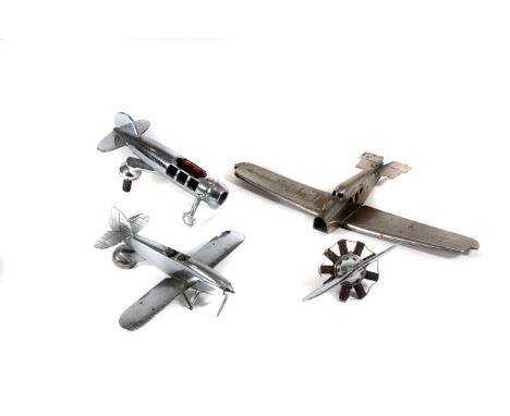 “Aeroplane Graveyard” A group of aeroplane car mascot or deskpiece display models c1930s: including Hawker Hart, Lindbergh Mo