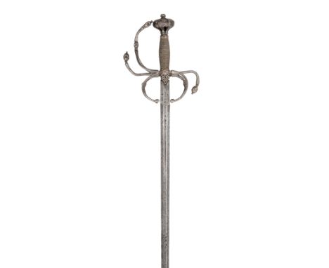 ‡ AN ITALIAN SWEPT-HILT RAPIER, CIRCA 1625-35 with associated tapering blade of flattened-hexagonal section, stuck with the i