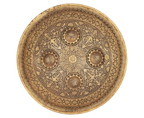 A FINE INDO-PERSIAN SHIELD (DHAL), 19TH CENTURY of shallow convex form, fitted with four domed bosses on the outside, each wi