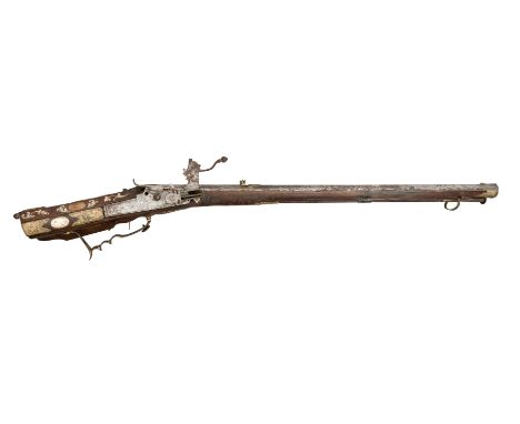 ‡ AN 18 BORE BOHEMIAN WHEEL-LOCK SPORTING RIFLE, CIRCA 1720, POSSIBLY FOR A LADY with octagonal swamped sighted barrel rifled