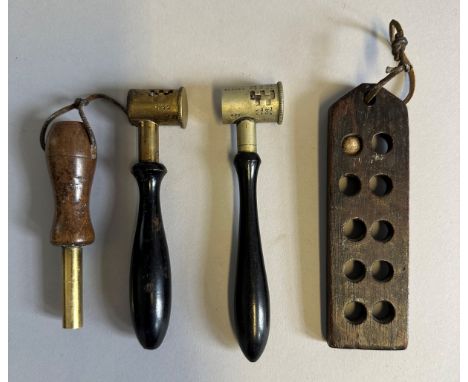 ‡ TWO POWDER MEASURES, 19TH CENTURY one with copper alloy graduated head and the other with nickel graduated head, and turned