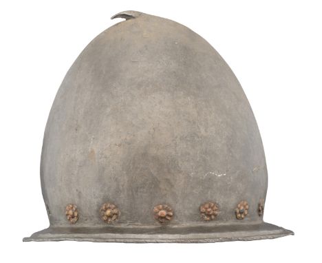 AN ITALIAN MORION IN THE 'SPANISH' FASHION, CIRCA 1590 formed in one piece with a rounded almond-shaped crown rising to a cur