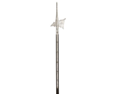 ‡ A GERMAN HALBERD, THIRD QUARTER OF THE 16TH CENTURY with robust tapering terminal spike of hollow-diamond section, slightly