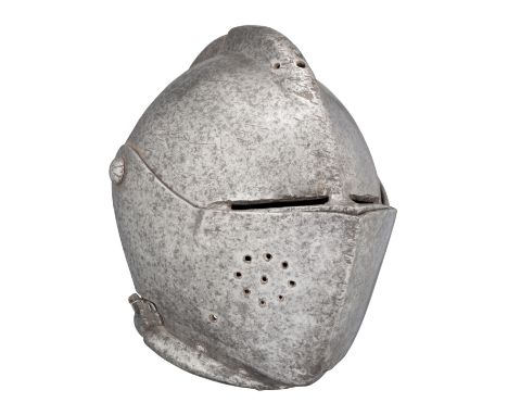 ‡ A NORTH ITALIAN CLOSE HELMET FOR THE FOOT TOURNEY, CIRCA 1590-1600 with a notably heavy rounded one-piece skull rising to a