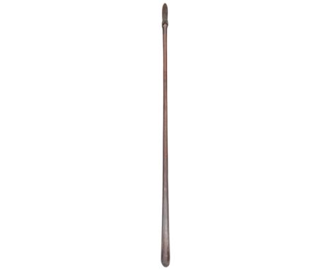 A RARE MAORI FIGHTING STICK OR QUARTER STAFF (TAIAHA OR HANI), 19TH CENTURY with carved stylised blind face and plain tongue 