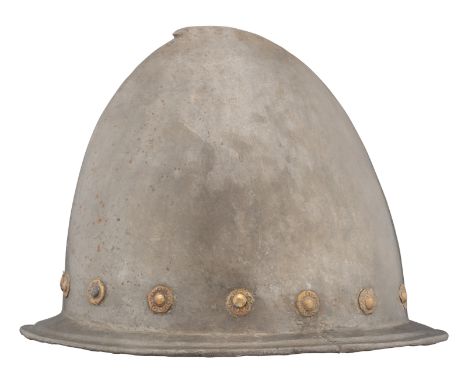 AN ITALIAN MORION IN THE 'SPANISH' FASHION, CIRCA 1590 formed in one piece with a rounded almond-shaped crown rising to a sli