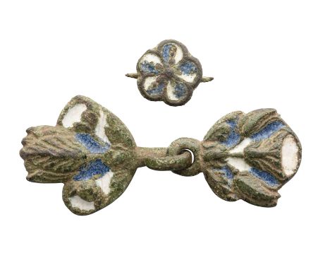 THREE ENAMELLED COPPER ALLOY BELT FITTINGS, LONDON, CIRCA 1660-70 comprising two flower-shaped plaques joined by a ring and l