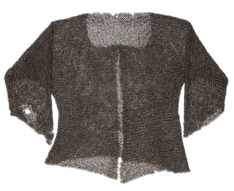A MAIL SHIRT, 17TH/18TH CENTURY, INDIAN OR NORTH AFRICAN formed entirely of riveted rings of near round-section wire, open at