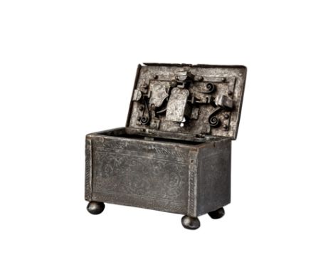 ‡ A SOUTH GERMAN ETCHED CASKET, 17TH CENTURY with hinged lid fitted on the inside with the mechanism, including scrolling spr
