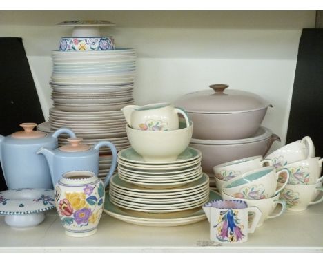 A collection of Poole pottery and Susie Cooper dinner, tea and decorative ware including an early Poole jug decorated with ha