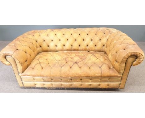 Brown leather Chesterfield two seat sofa, length 180cm