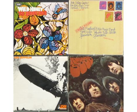 Approximately 35 albums including Led Zeppelin (1 and 2 both plum), The Beatles (With, Rubber Soul and Pepper all black/yello