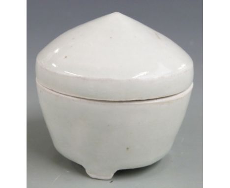Bernard Leach, St Ives Pottery (1887-1979), celadon glazed conical studio pottery box and cover raised on three bracket feet,