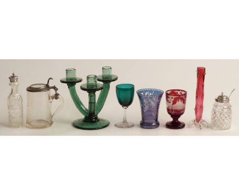 Eleven pieces of coloured glassware including a pair of flash overlaid amethyst vases with cut decoration, Murano style vases