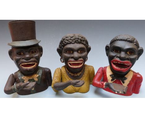 Three vintage novelty cast iron mechanical money boxes, two men, one with hat and a lady, tallest 20cm