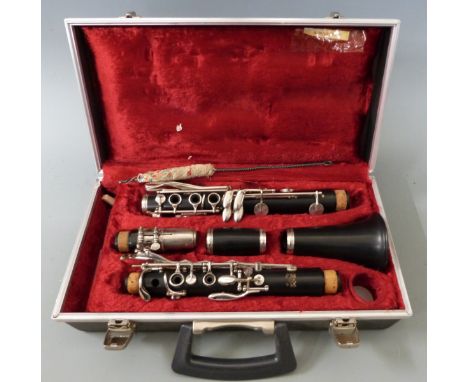 Cased Boosey and Hawkes composite bodied clarinet