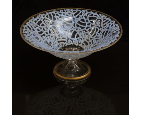 Glass tazza or bonbon dish with blue and white enamel decoration in the form of stylised hearts and gilt rim and foot, 18cm i